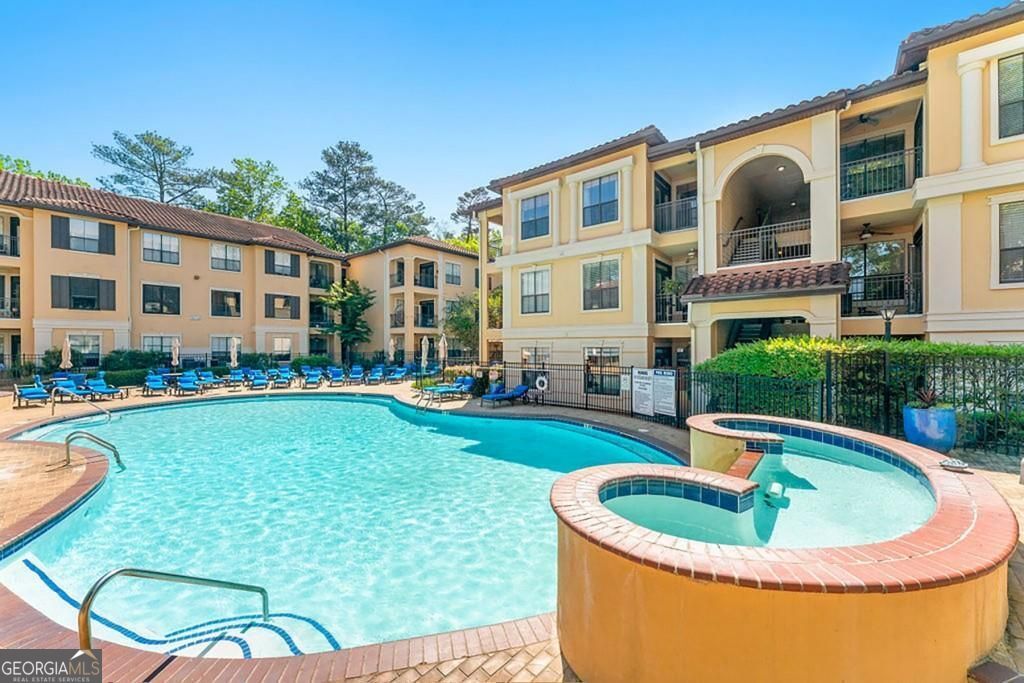 3777 Peachtree Road Northeast Brookhaven, GA 30319 - Photo 22 of 26 HOA fees include Gated Entry, 24/7 Security, Clubhouse w/ Concierge Service, Fitness Center, Resort-Style Pool, Theater Room, Game Room, Office Space, Grilling Areas, & Dog Park. Trash Pickup twice per week outside your door!