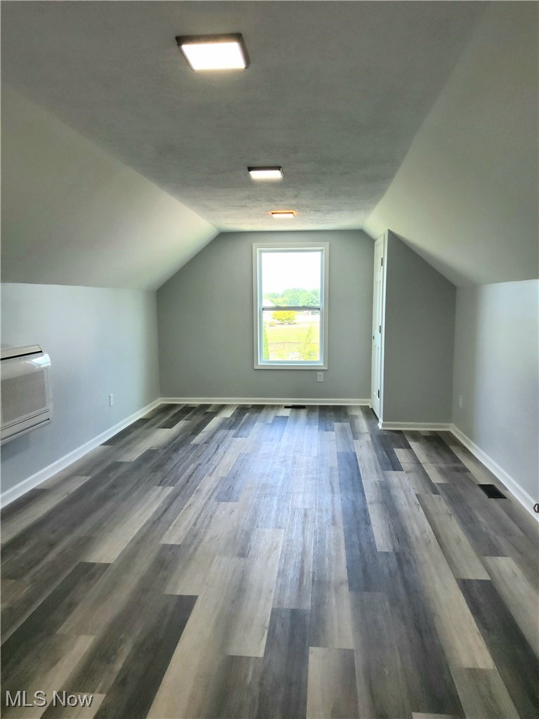 9415 Stone Road Litchfield, OH 44253 - Photo 18 of 28 2nd floor bedroom featuring wall mount HVAC unit.