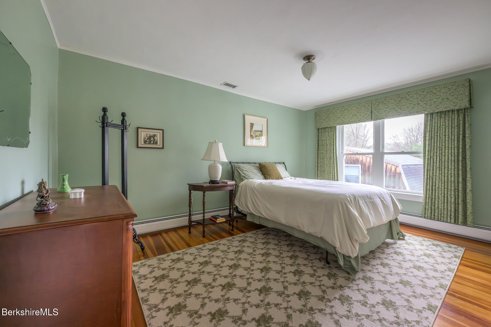 11 Sergeant Street Stockbridge, MA 01262 - Photo 30 of 52 a bedroom with a bed and a desk