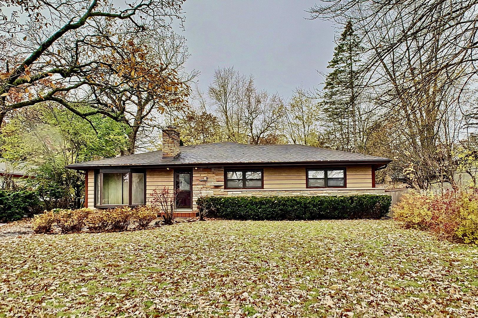 4705 Timberlane Road Crystal Lake, IL 60014 - Photo 2 of 29 front view of a house with a yard