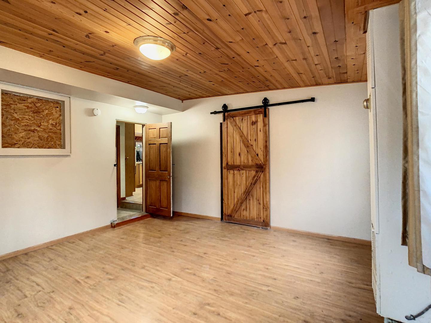 4705 Timberlane Road Crystal Lake, IL 60014 - Photo 14 of 29 a view of empty room with wooden floor