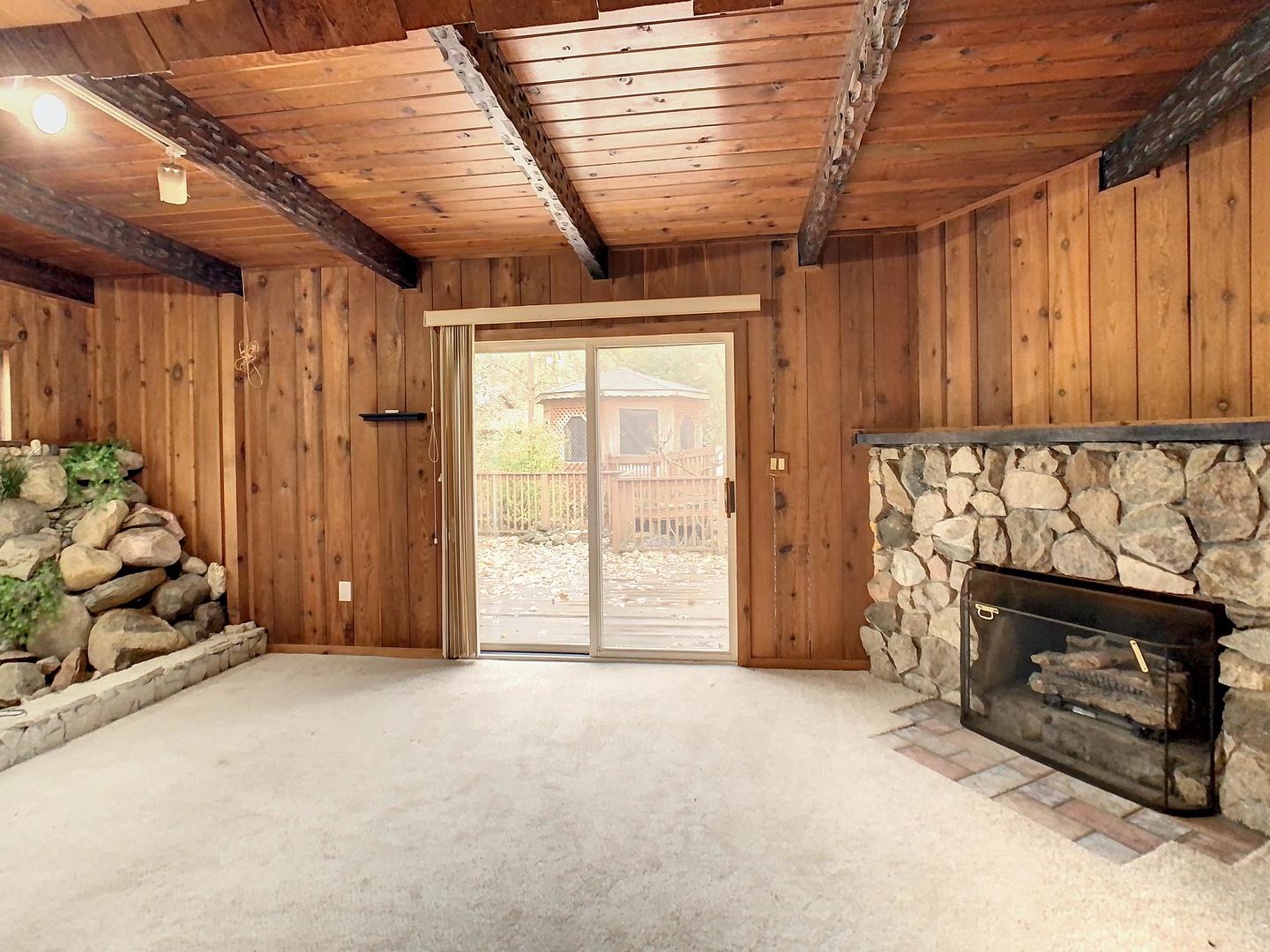 4705 Timberlane Road Crystal Lake, IL 60014 - Photo 18 of 29 a view of an empty room with a fireplace