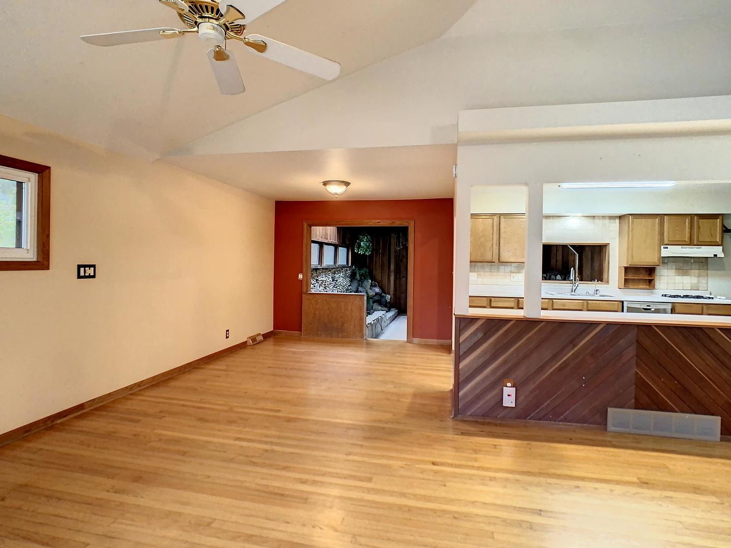 4705 Timberlane Road Crystal Lake, IL 60014 - Photo 7 of 29 a view of kitchen and dining room with wooden floor