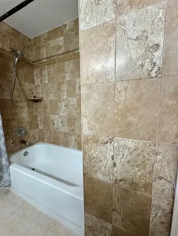 a bathroom with a bathtub