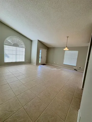 a view of a room with a sink and a window