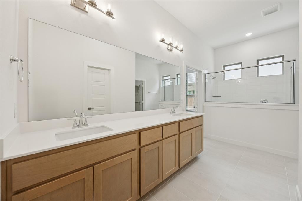 1904 Palmetto Road Celina, TX 75009 - Photo 16 of 33 Primary Bathroom in the Monet II home plan by Trophy Signature Homes – REPRESENTATIVE PHOTO