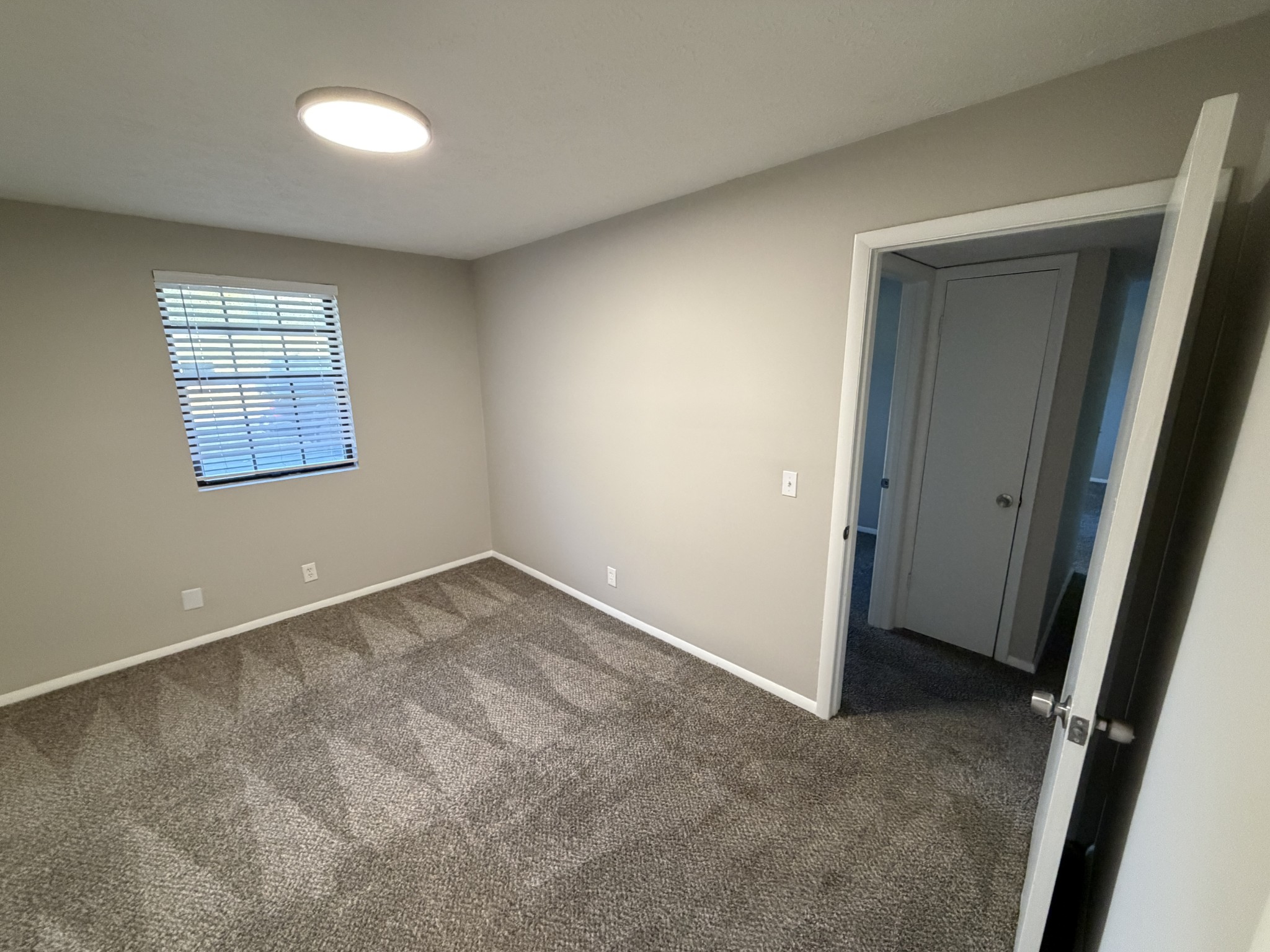 1325 Ardee Avenue, Unit B Nashville, TN 37216 - Photo 13 of 13 an empty room with a window