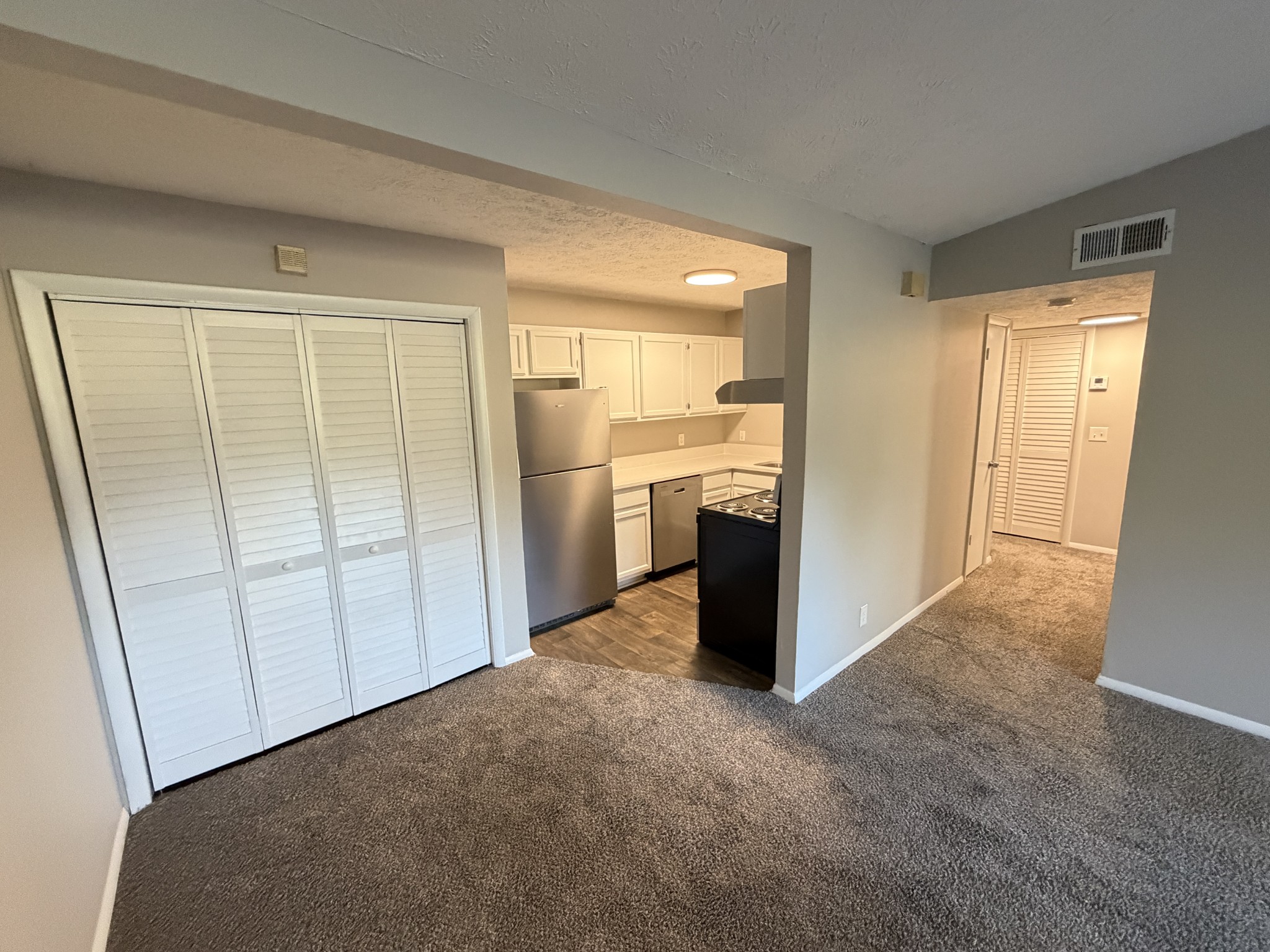 1325 Ardee Avenue, Unit B Nashville, TN 37216 - Photo 4 of 13 a view of a kitchen with a refrigerator and a sink