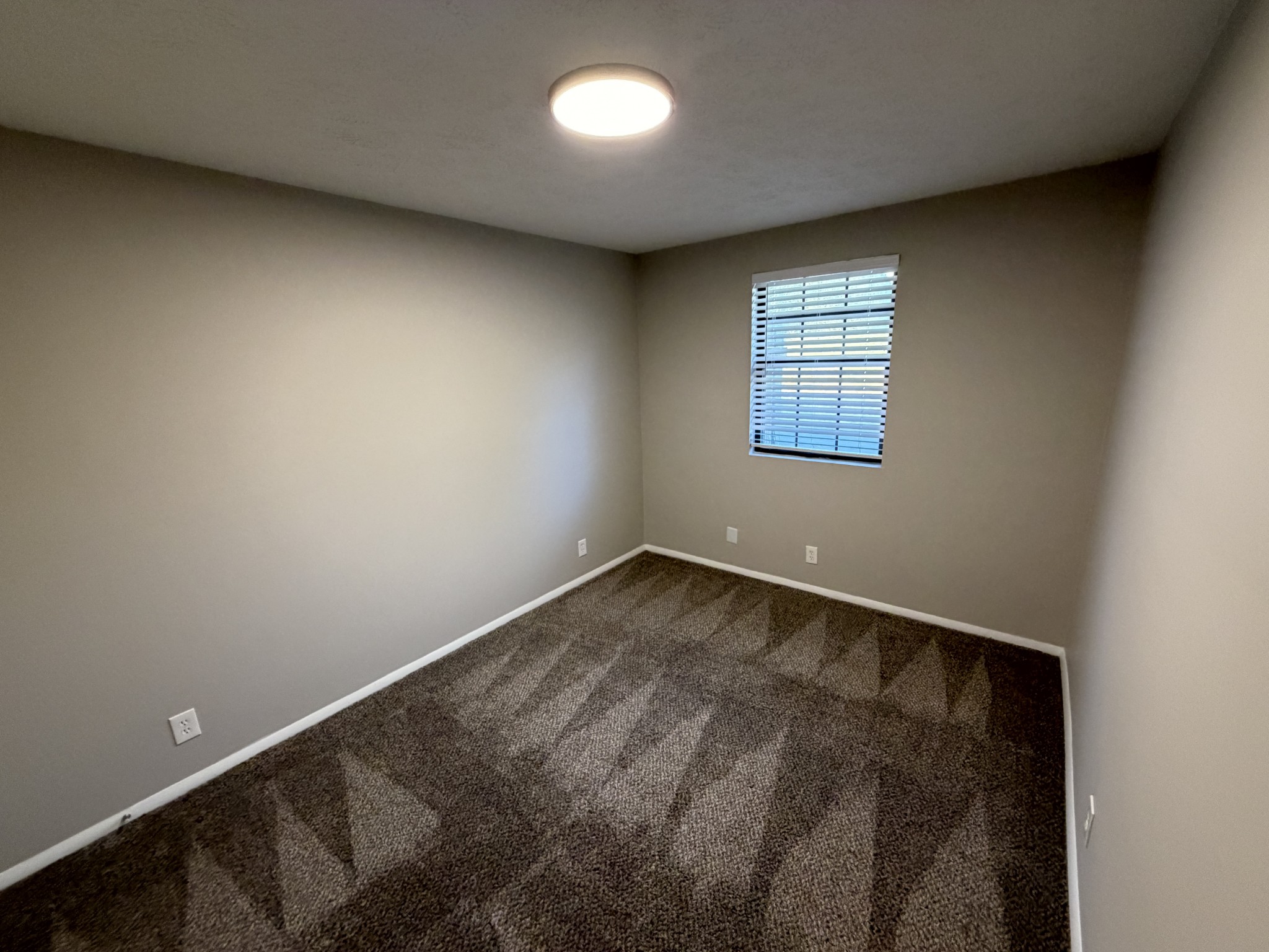 1325 Ardee Avenue, Unit B Nashville, TN 37216 - Photo 10 of 13 an empty room with a window