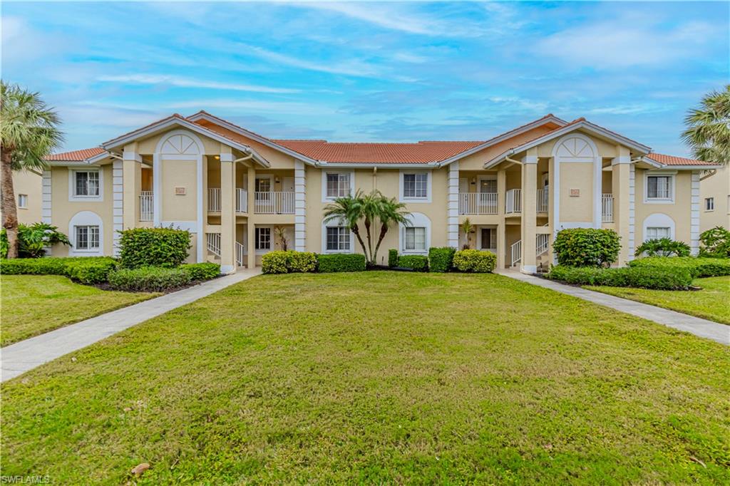 7761 Jewel Lane, Unit 202 Naples, FL 34109 - Photo 1 of 27 View of front of house with a front yard