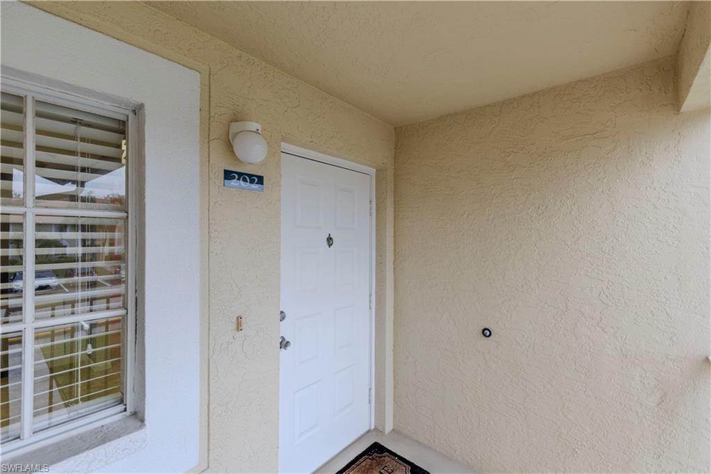 7761 Jewel Lane, Unit 202 Naples, FL 34109 - Photo 3 of 27 View of entrance to property