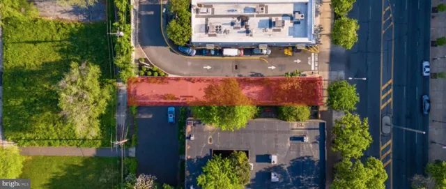 an aerial view of a house with a garden