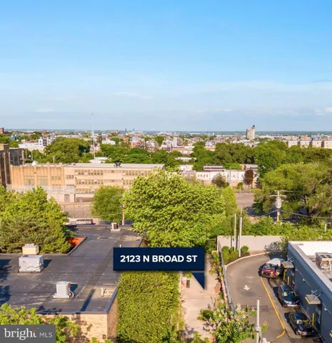a picture of a bathroom with a shower and a shower