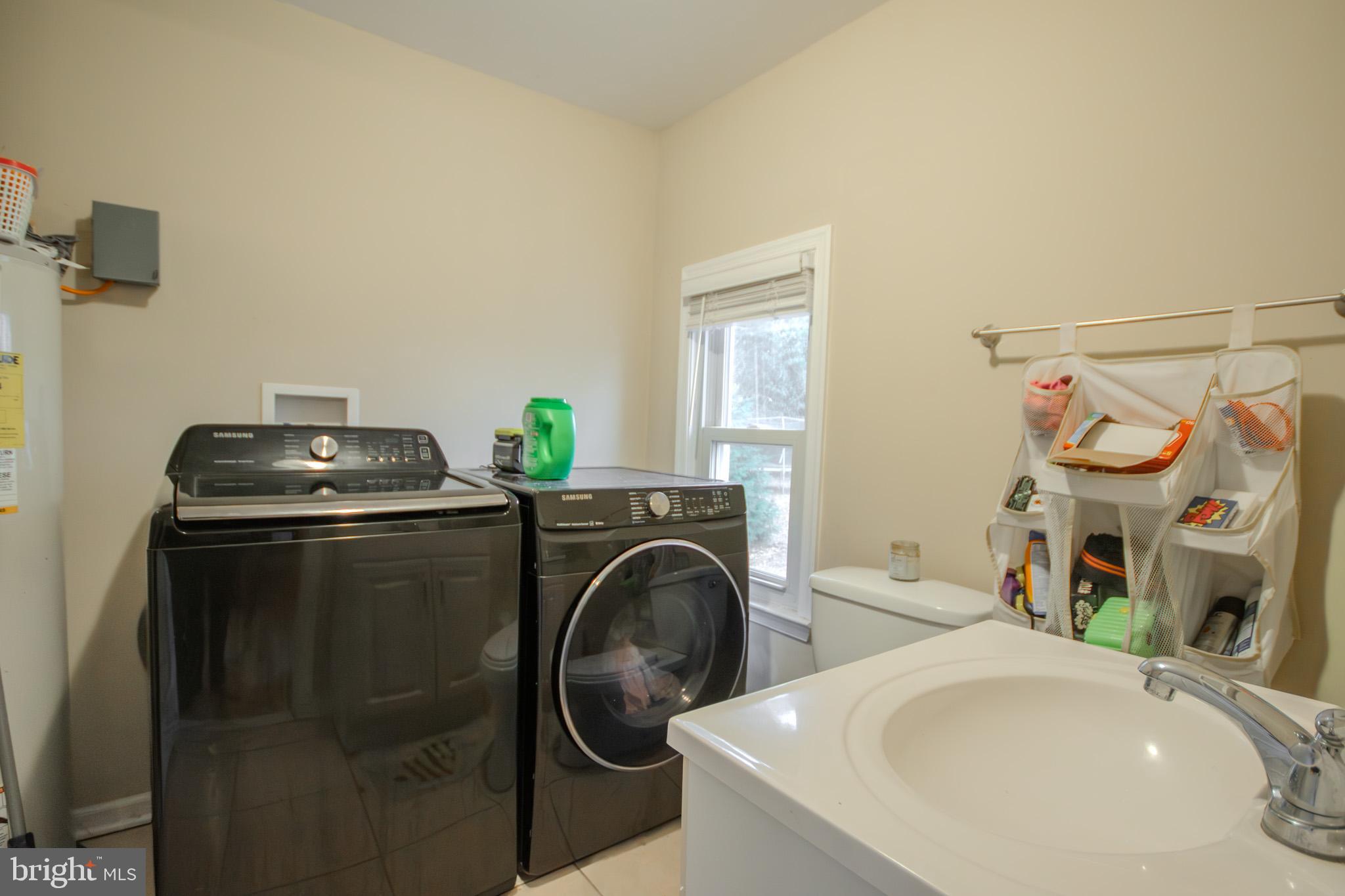 101 Culver Street Hebron, MD 21830 - Photo 16 of 33 a utility room with dryer and washer