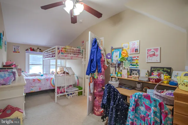 a room with furniture and a bed