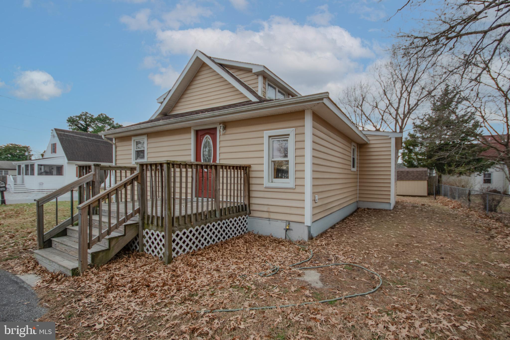 101 Culver Street Hebron, MD 21830 - Photo 30 of 33 a view of a house with a yard