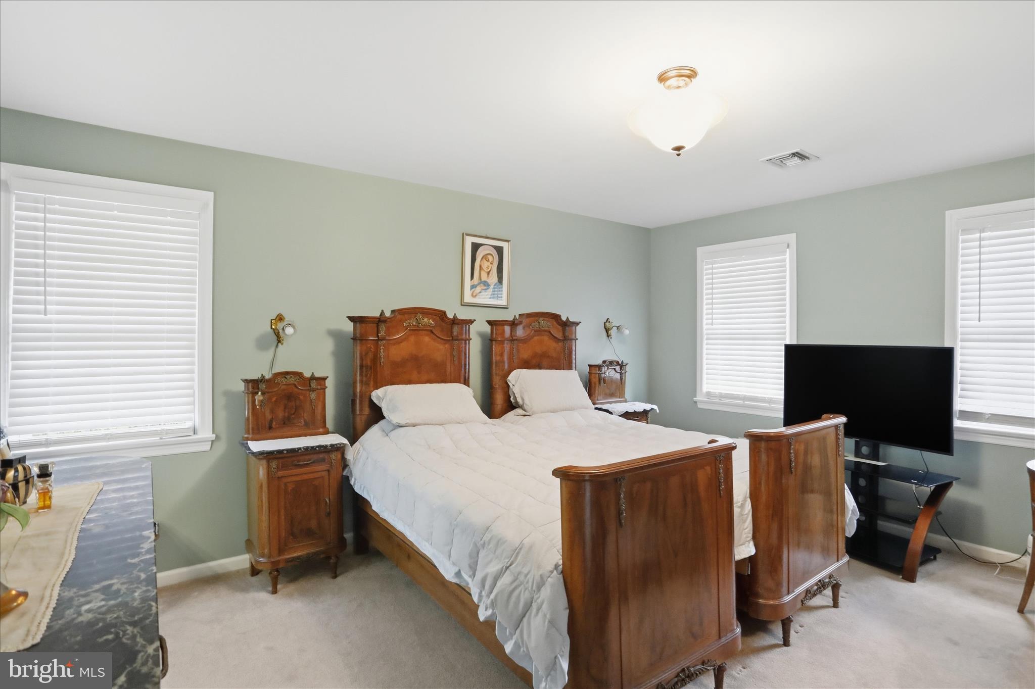 1175 North Lakewood Drive Ridgeley, WV 26753 - Photo 22 of 33 a bedroom with a bed and a tv