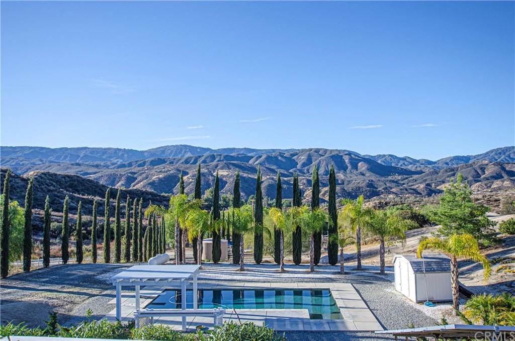 Panoramic view from the deck looking down at the pool