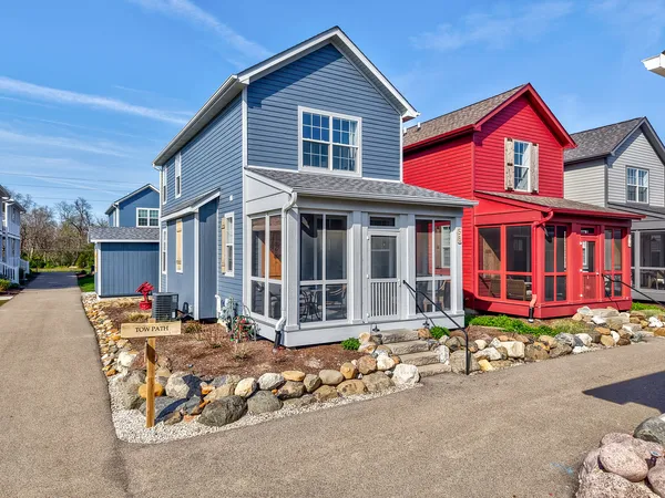 front view of a house with a yard