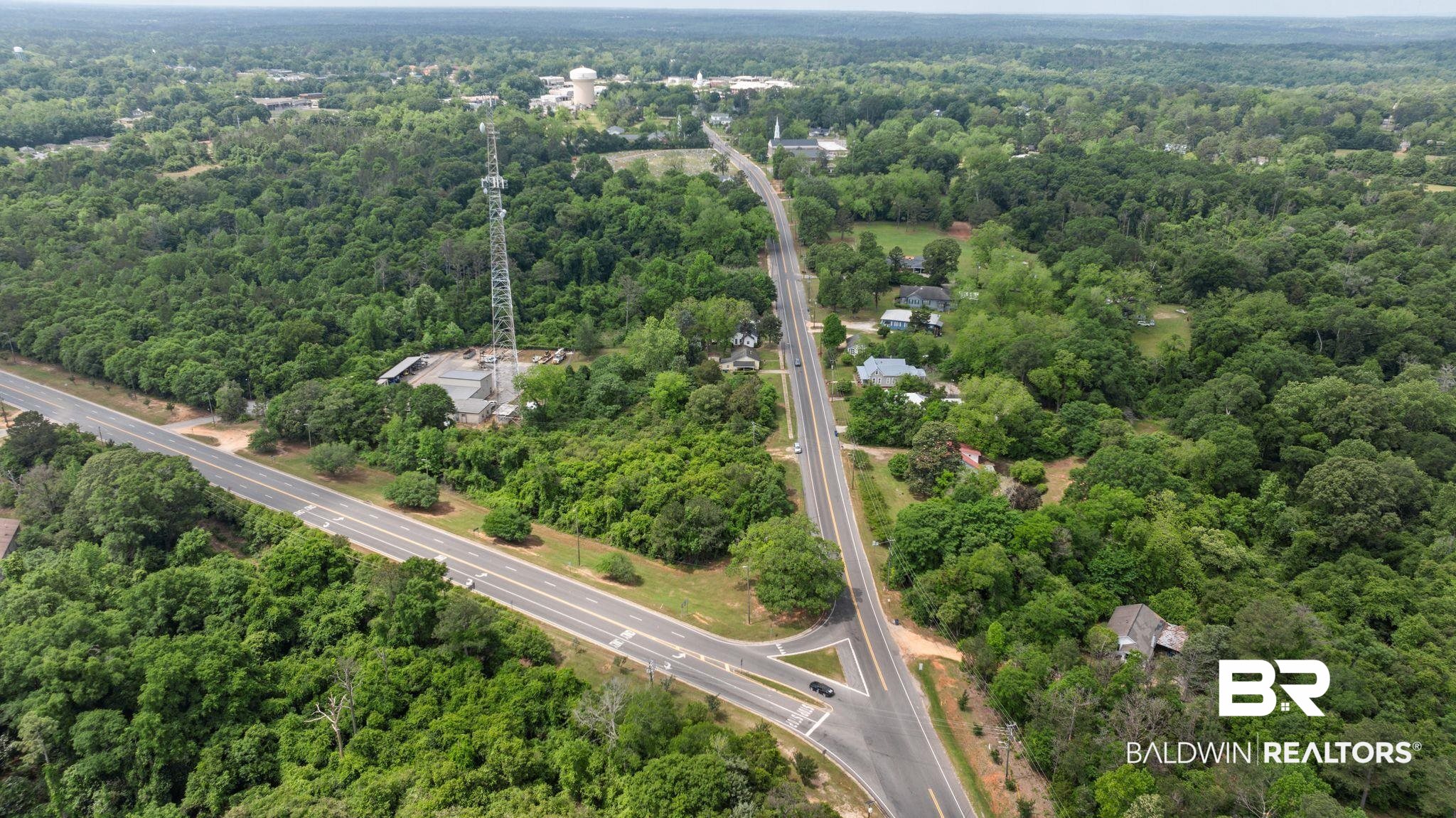 733 Pineville Road Monroeville, AL 36460 - Photo 60 of 68 Aerial view with a wooded view