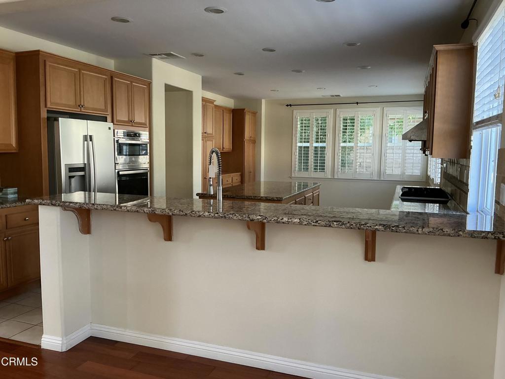 13687 Blue Ridge Way Moorpark, CA 93021 - Photo 15 of 56 a room with gym equipment and windows