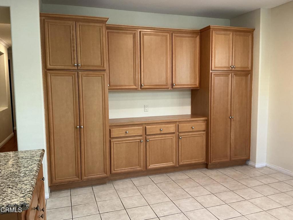13687 Blue Ridge Way Moorpark, CA 93021 - Photo 16 of 56 a kitchen with white cabinets