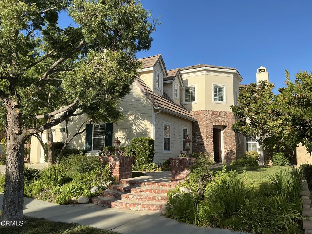 13687 Blue Ridge Way Moorpark, CA 93021 - Photo 2 of 56 a front view of a house with a yard