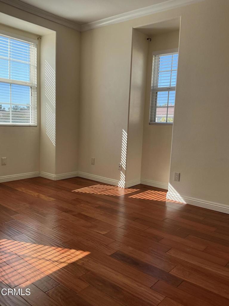 13687 Blue Ridge Way Moorpark, CA 93021 - Photo 24 of 56 a view of empty room with wooden floor and fan