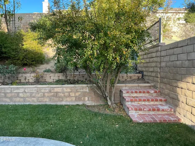 swimming pool view with a outdoor seating space