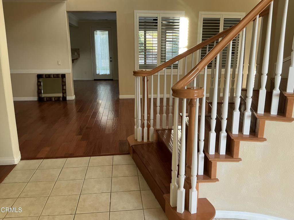 13687 Blue Ridge Way Moorpark, CA 93021 - Photo 6 of 56 a view of entryway and hall with wooden floor