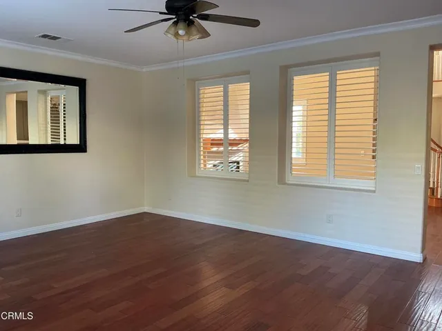 a large kitchen with stainless steel appliances granite countertop a stove and a sink
