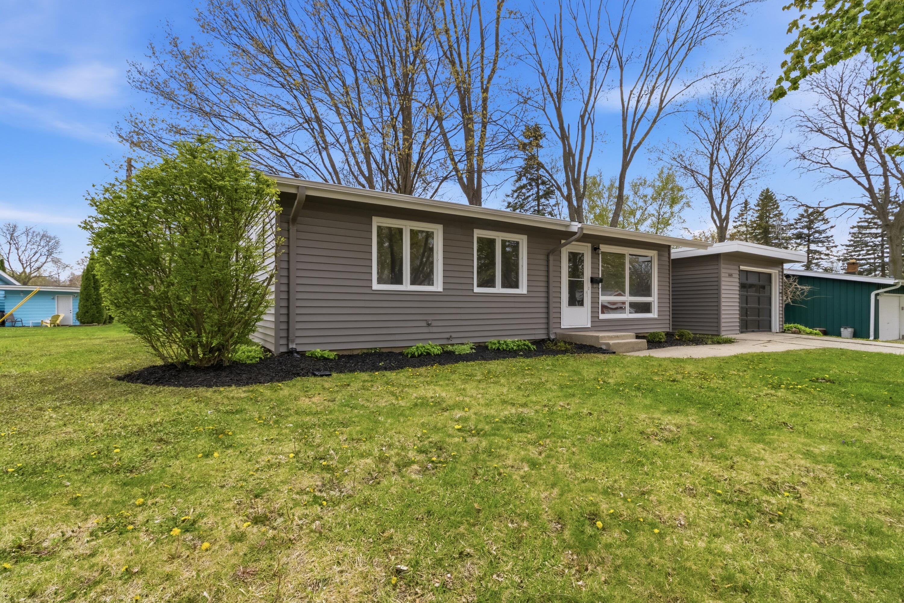 7405 Eaton Lane Greendale, WI 53129 - Photo 2 of 34 Front Side View