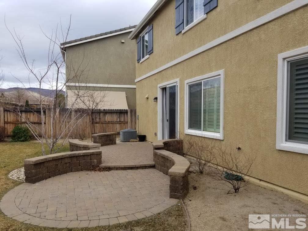 2035 Angel Ridge Drive Reno, NV 89521 - Photo 23 of 23 a living room with furniture and a window