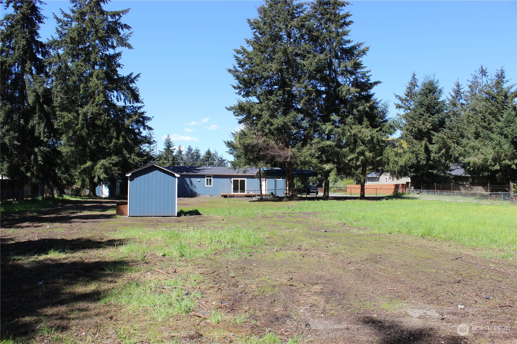 17736 Pendleton Street Southwest Rochester, WA 98579 - Photo 35 of 38 a house with trees in front of it