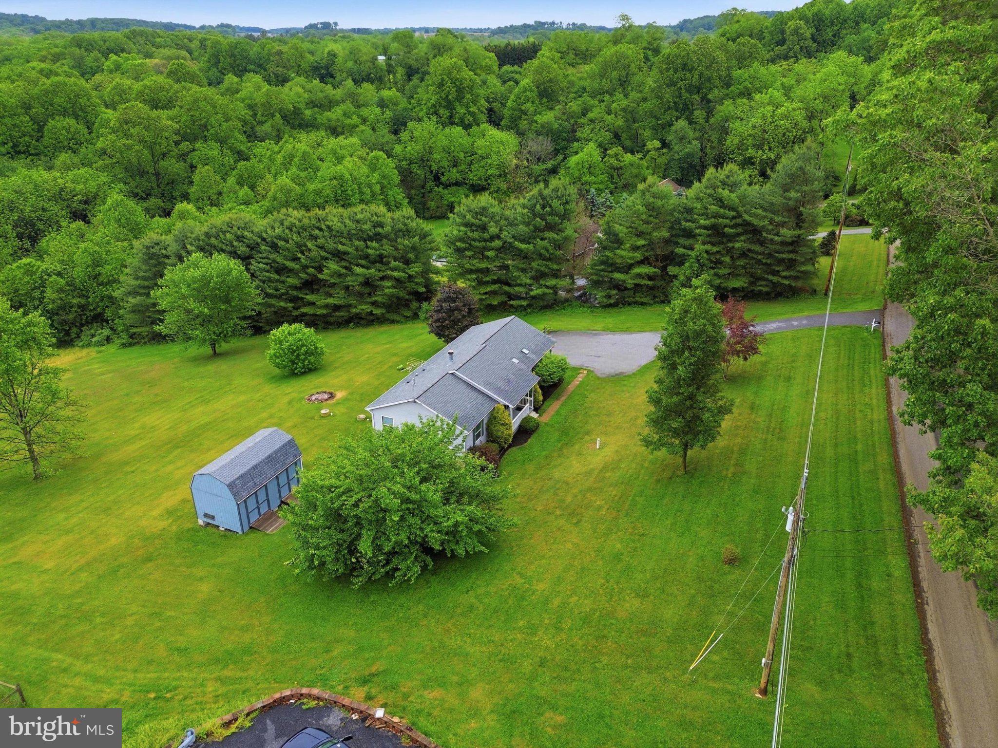 491 Garvine Mill Road Fawn Grove, PA 17321 - Photo 43 of 47 an aerial view of a house with a yard