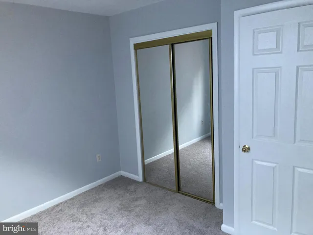 an empty room with closet