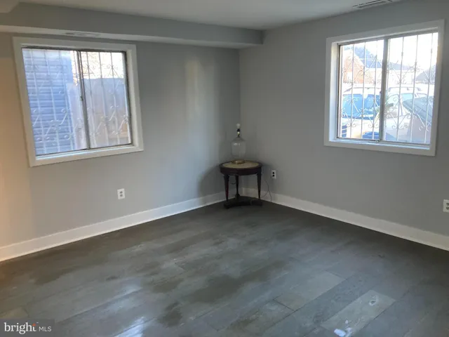 a view of a room that has a window in it