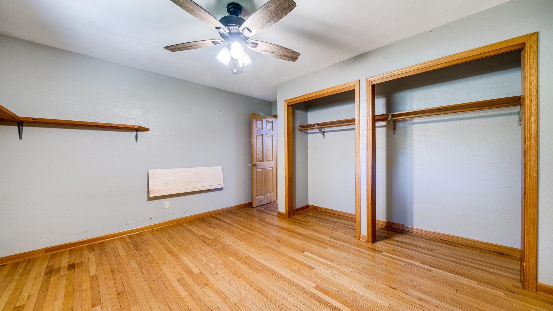 313 West Margaret Fuller Road Oregon, IL 61061 - Photo 24 of 46 a view of an empty room and wooden floor