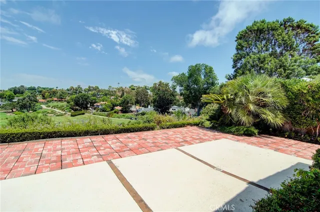 a bathroom with a sink mirror vanity and toilet