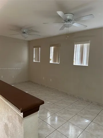 a room with a walk in closet and a window