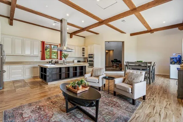 a living room with furniture and a table