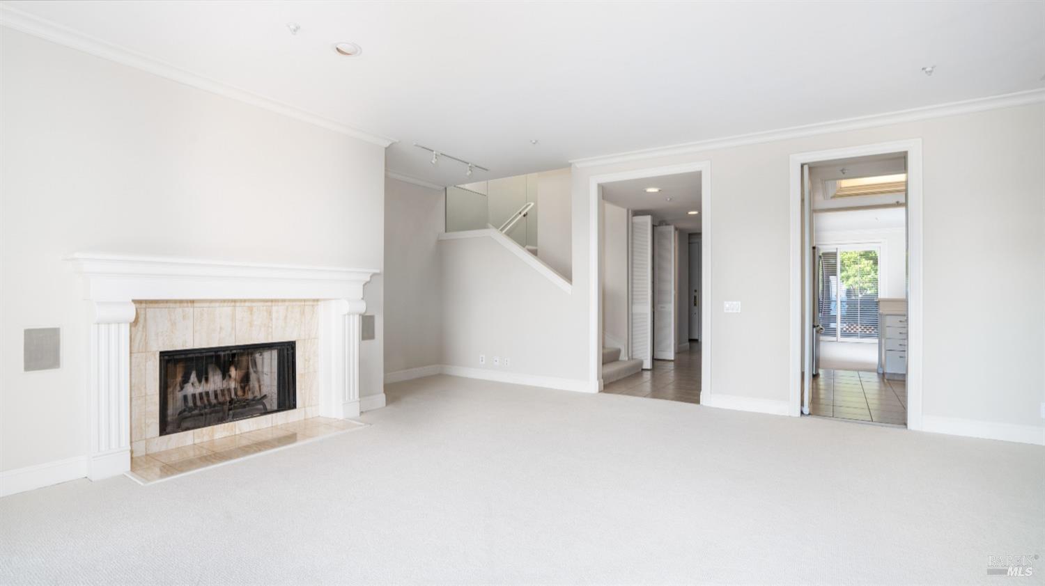 206 Paradise Drive Tiburon, CA 94920 - Photo 13 of 45 a view of a livingroom with a fireplace