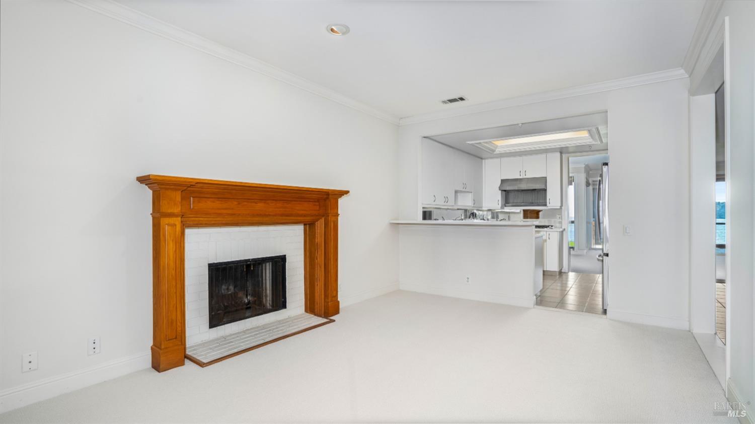 206 Paradise Drive Tiburon, CA 94920 - Photo 18 of 45 a view of a livingroom with a fireplace