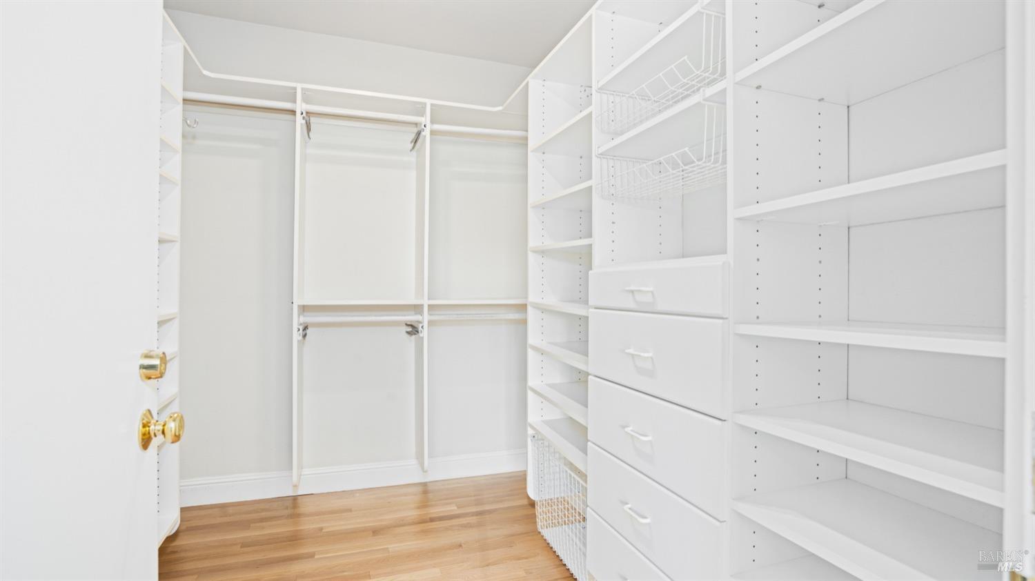 206 Paradise Drive Tiburon, CA 94920 - Photo 40 of 45 a view of walk in closet with empty racks