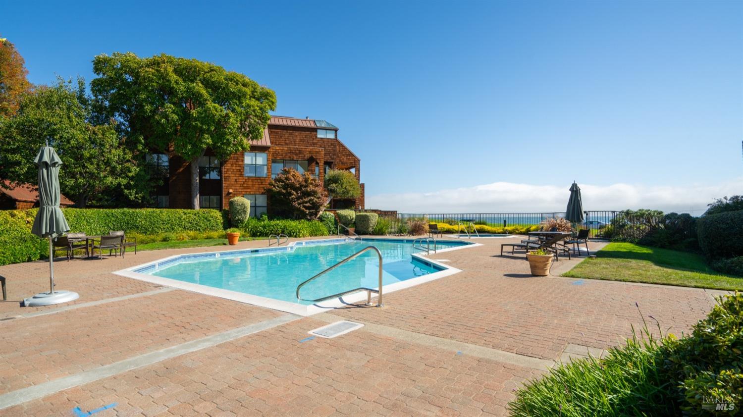 206 Paradise Drive Tiburon, CA 94920 - Photo 41 of 45 an outdoor space with pool and furniture
