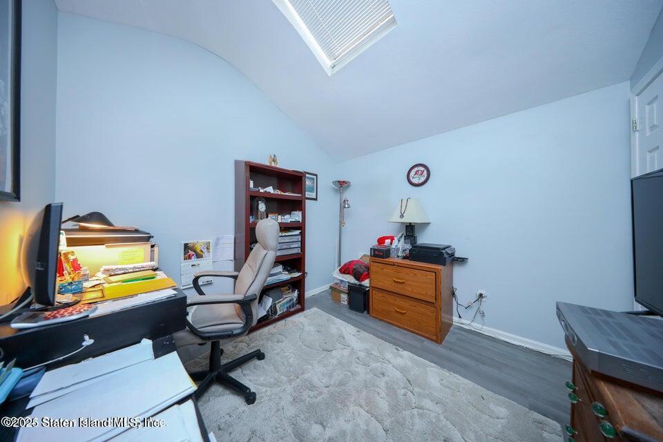 69 Token Street Staten Island, NY 10312 - Photo 14 of 22 a room with furniture and a flat screen tv