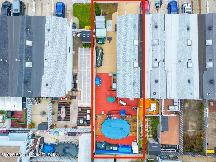 69 Token Street Staten Island, NY 10312 - Photo 4 of 22 an aerial view of residential houses with outdoor space