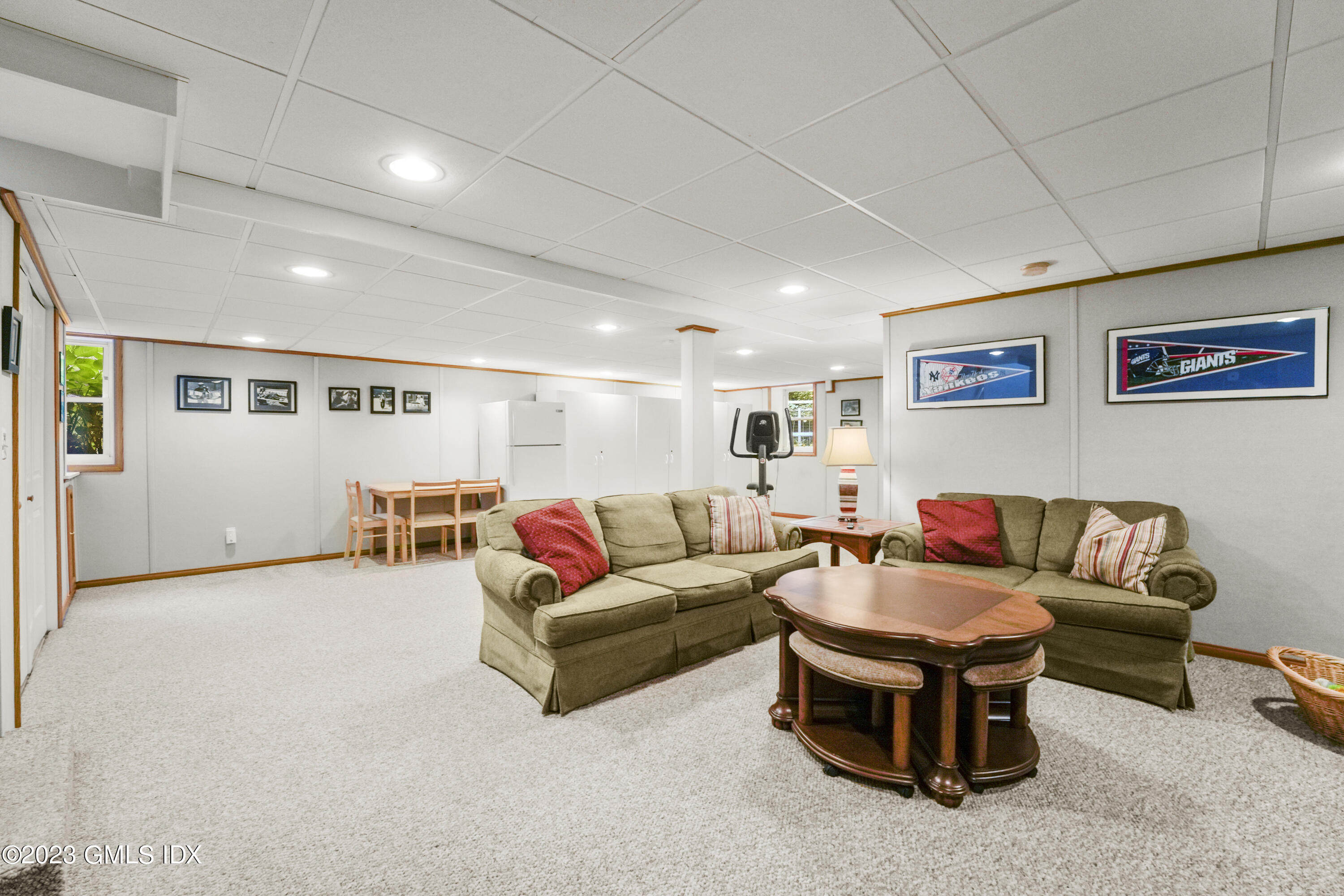 21 Barton Lane Cos Cob, CT 06807 - Photo 14 of 22 a living room with furniture and a table