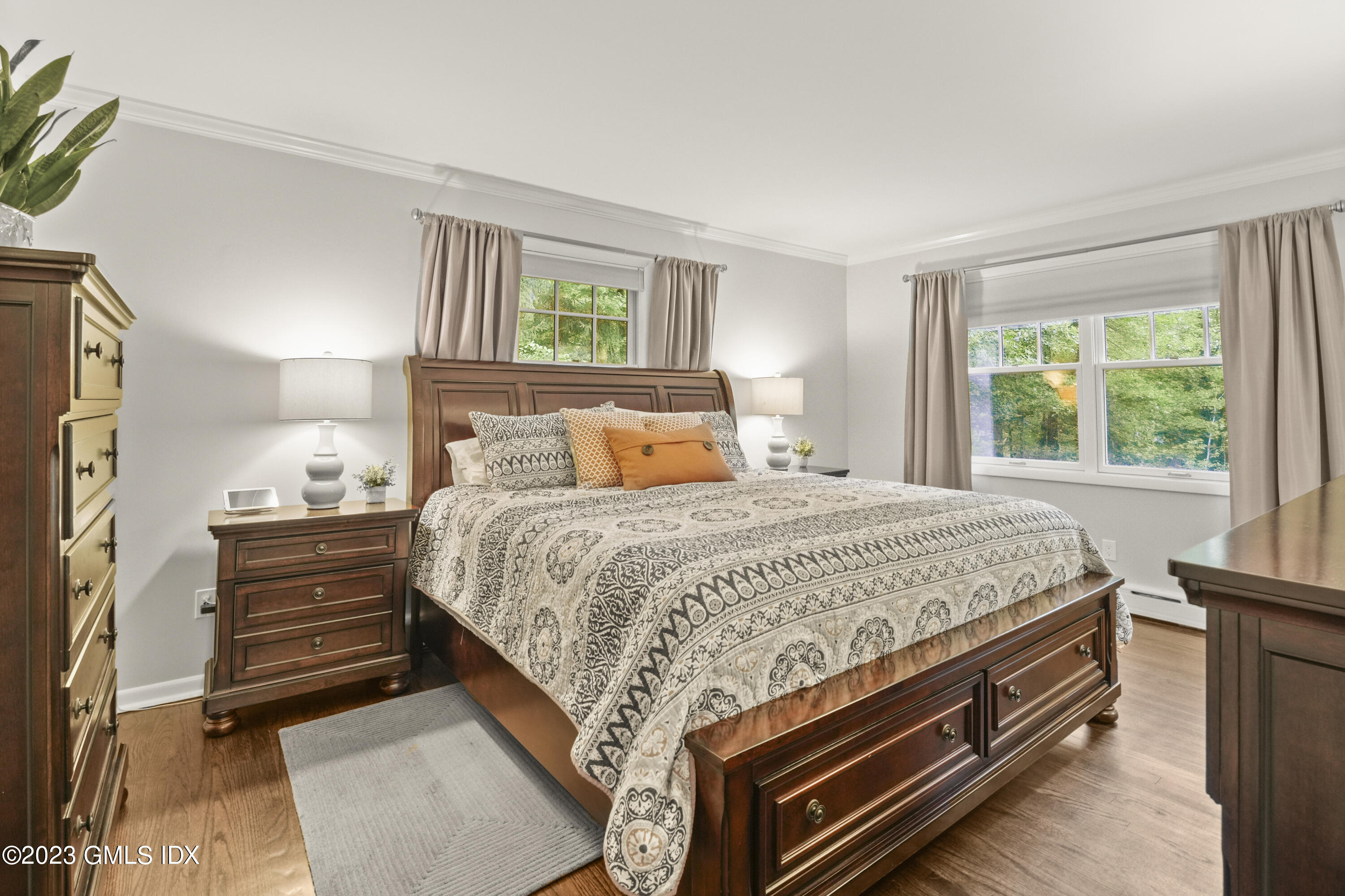 21 Barton Lane Cos Cob, CT 06807 - Photo 7 of 22 a bed sitting in a bedroom next to a window