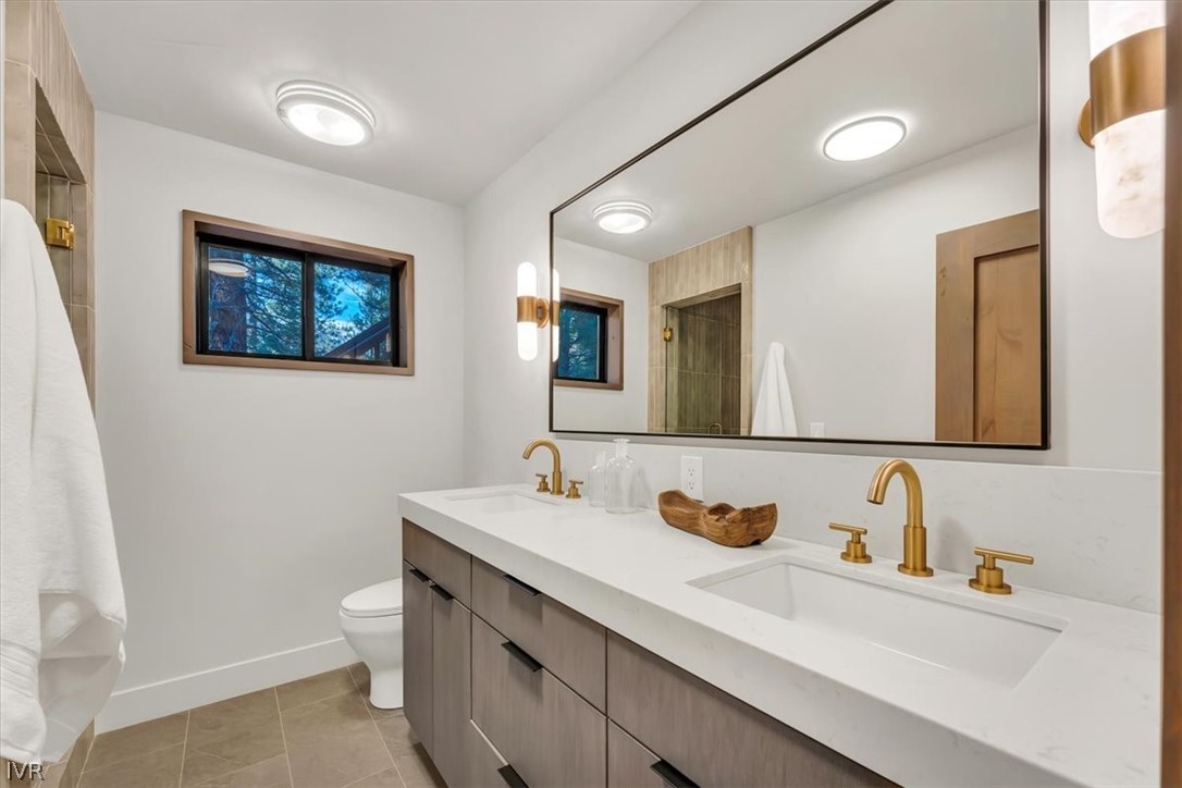 877 Tyner Way Incline Village, NV 89451 - Photo 26 of 43 a bathroom with a sink and a mirror
